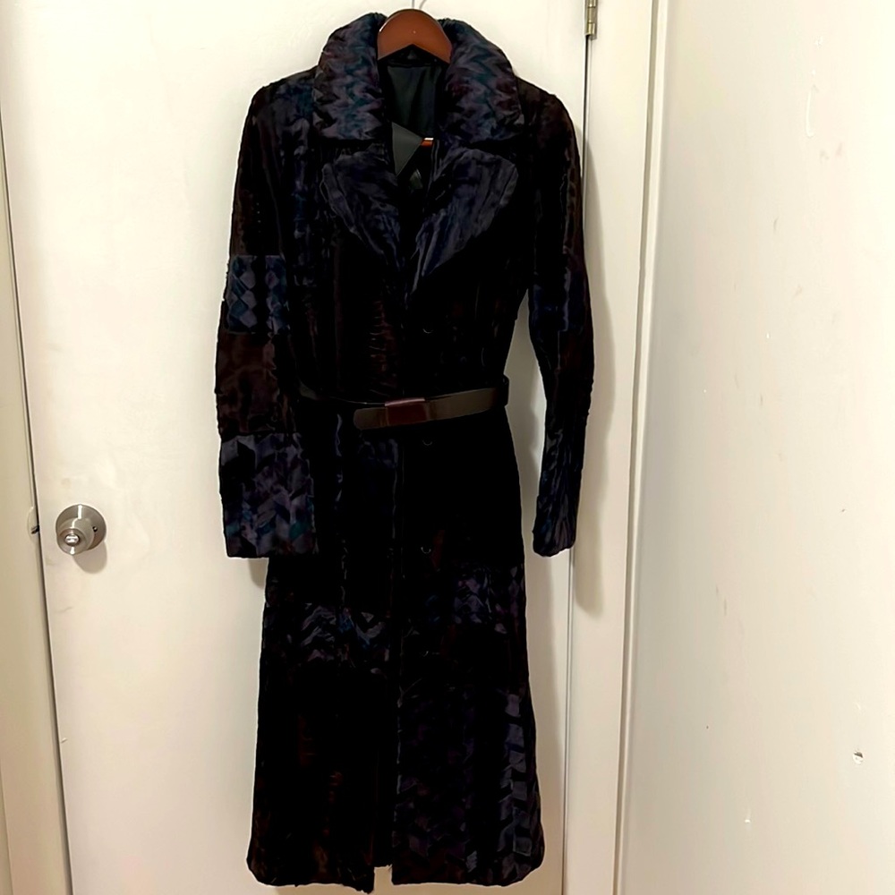 It’s special technique cut fur hand made coat . Designer luxurious from Europe